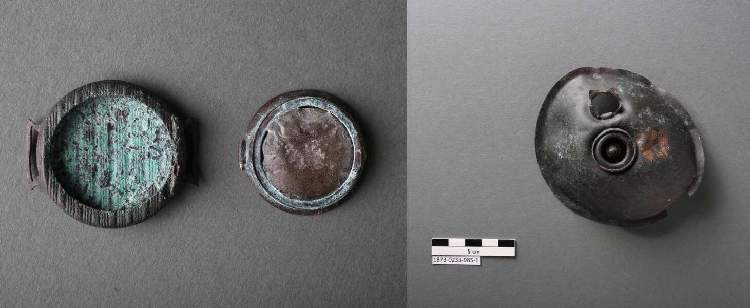 Photographs of other finds at Tempelhof: two parts of a medallion and the remnant of a hand lamp.