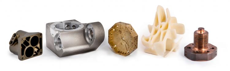 Metal and plastic parts created on-demand by 3-D printing and traditional methods.
