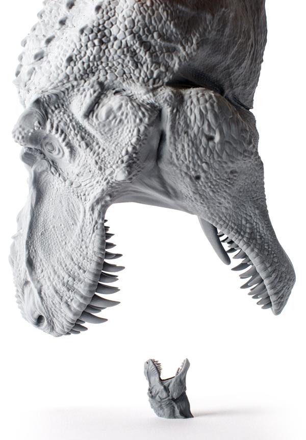 A large and a small T. rex toy face off.