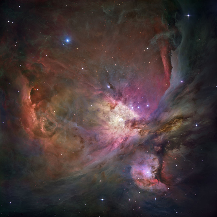 Image shows the Orion Nebula in space.