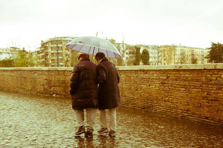 Elderly couple in the rain