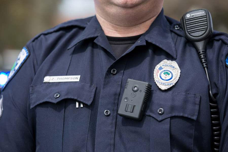 Photograph of a police officer wearing a body camera.